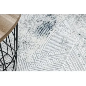 Koberec DUKE 51558 krémový/ modrý, geometrický / vintage / strapce