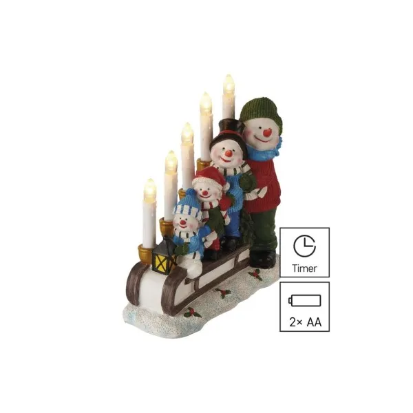 EMOS LED svietnik – snehuliaci na saniach, 24 cm, 2x AA, vnútorný, teplá biela, časovač