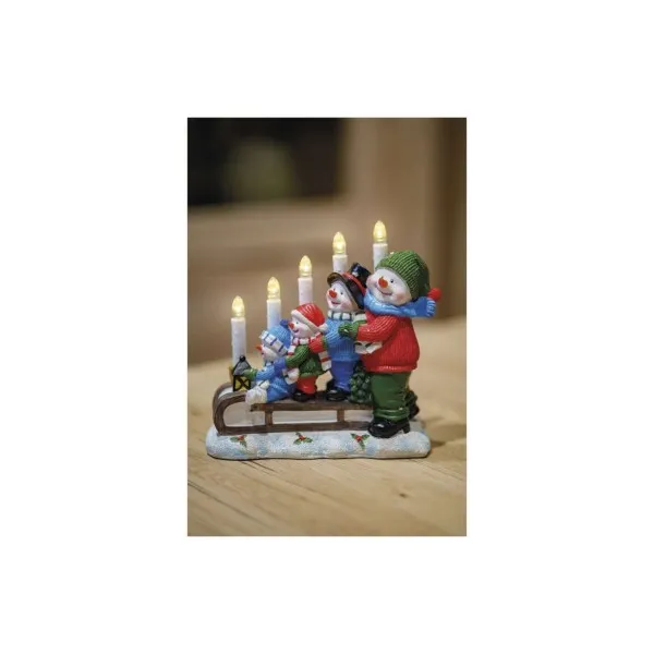EMOS LED svietnik – snehuliaci na saniach, 24 cm, 2x AA, vnútorný, teplá biela, časovač