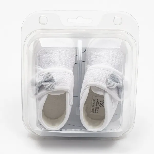 Dojčenské capačky s mašličkou New Baby biela Veľkosť: 12-18 m