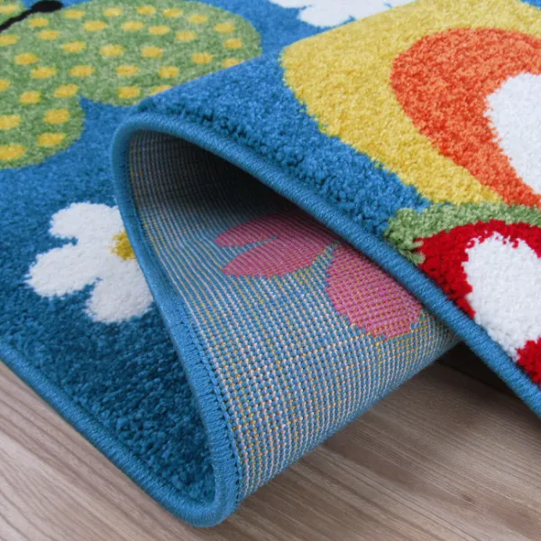 Detský koberec s motýlikmi v modrej farbe 19685-135522