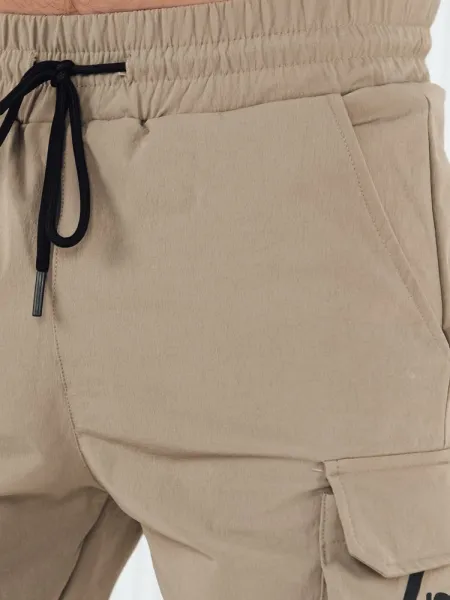 Trendy jogger kapsáčové nohavice pre pánov béžové