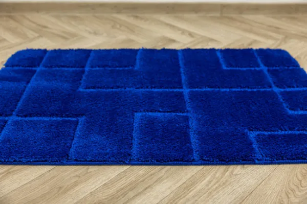 Kúpeľňový koberček Inez modrý, geometrický
