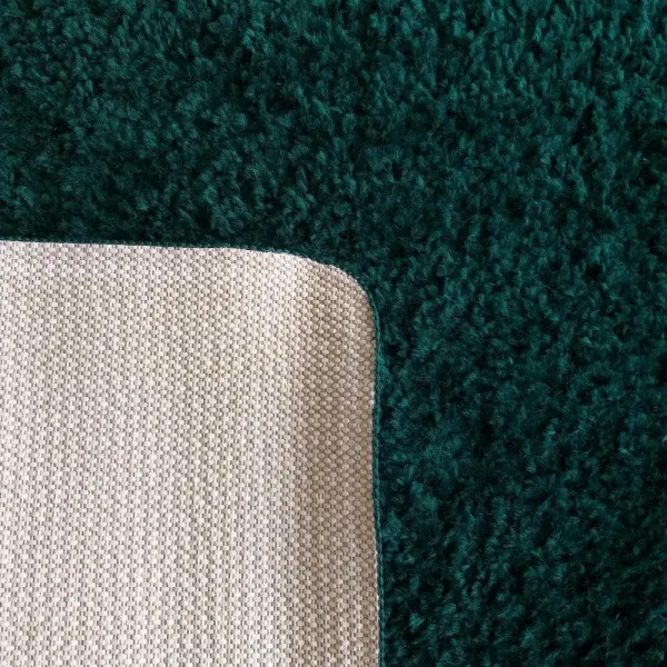Domtextilu Štýlový koberec v tmavozelenej farbe Šírka: 80 cm | Dĺžka: 150 cm 30911_26388