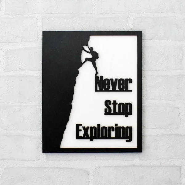 Drevený motivačný obraz s citátom - Never Stop Exploring