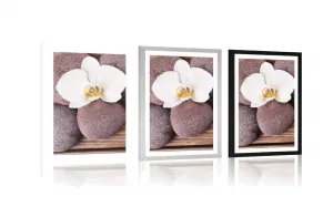 Plagát s paspartou wellness kamene a orchidea na drevenom pozadí