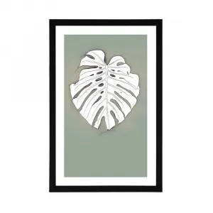 Plagát s paspartou monstera na zelenom podklade