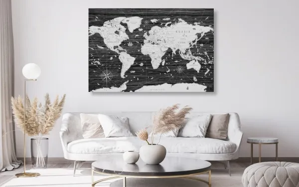 Obraz na korku čiernobiela mapa na drevenom pozadí
