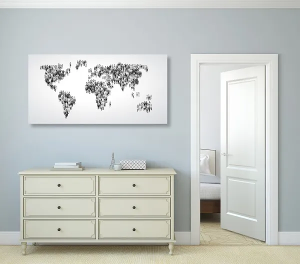 Obraz na korku mapa sveta pozostávajúca z ľudí v čiernobielom prevedení