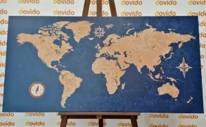 Obraz na korku mapa sveta s kompasom v retro štýle na modrom pozadí