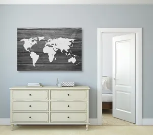 Obraz čiernobiela mapa sveta s dreveným pozadím
