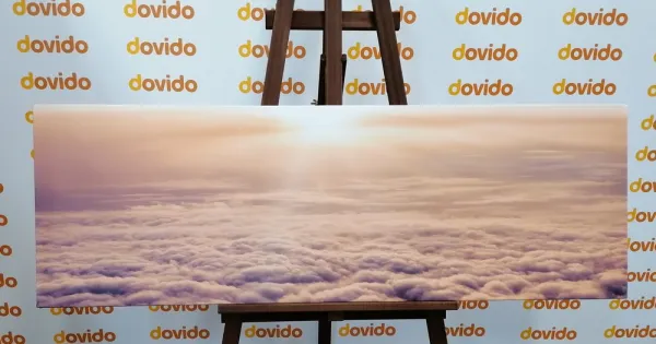 Obraz západ slnka z okna lietadla