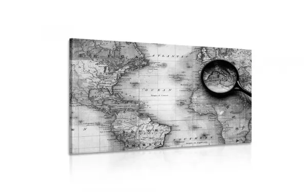 Obraz čiernobiela mapa sveta s lupou