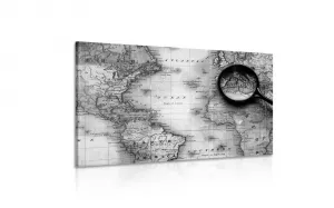 Obraz čiernobiela mapa sveta s lupou