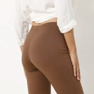 Hrejivé bootcut legíny z česaného moltonu