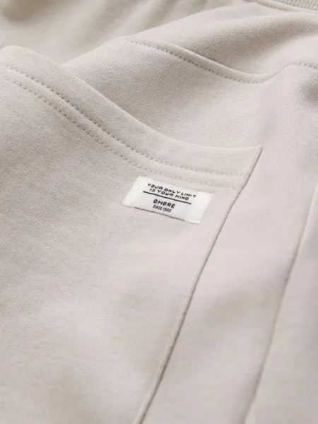 Pánske trendy tepláky béžové