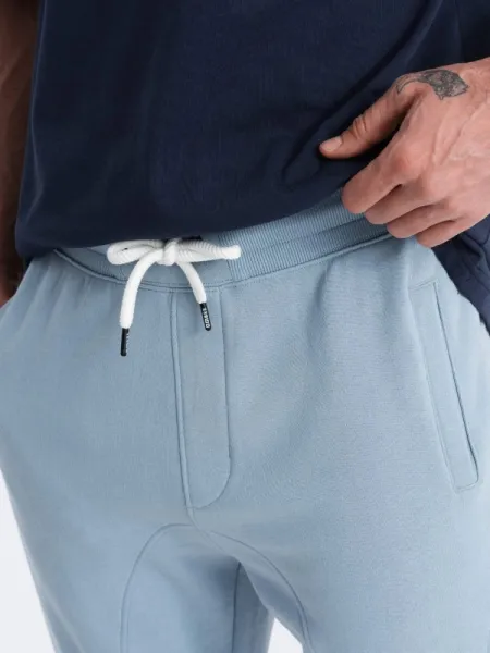 Pánske trendy tepláky svetlo modré