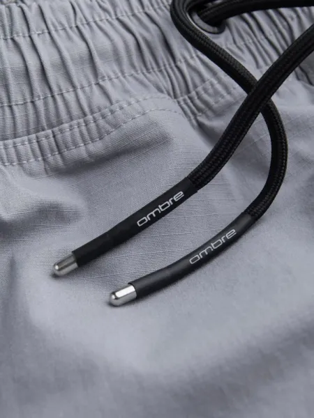 Trendy jogger kapsáčové nohavice pre pánov šedé