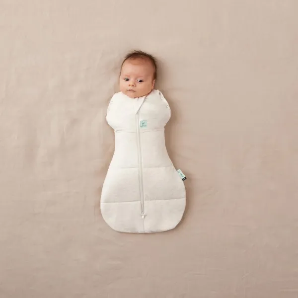 ERGOPOUCH Zavinovačka a vak na spaní 2v1 Cocoon Oatmeal Marle 0-3 m, 3-6 kg, 2,5 tog