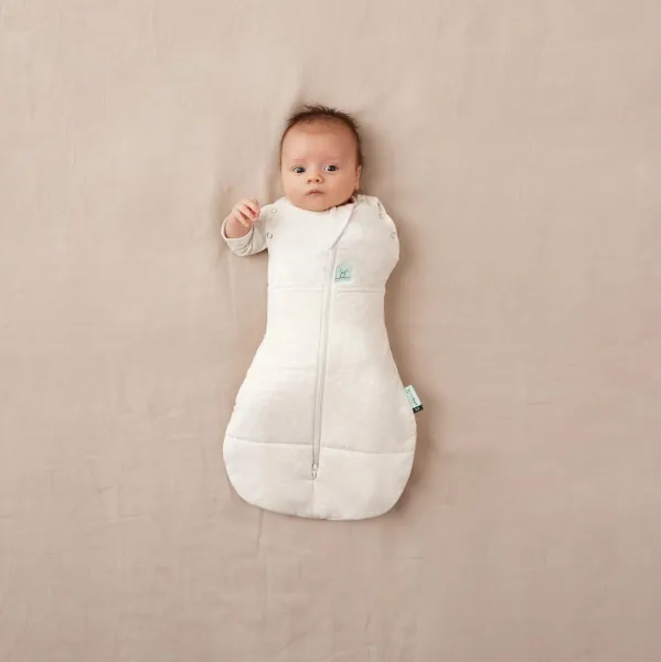 ERGOPOUCH Zavinovačka a vak na spaní 2v1 Cocoon Oatmeal Marle 0-3 m, 3-6 kg, 2,5 tog