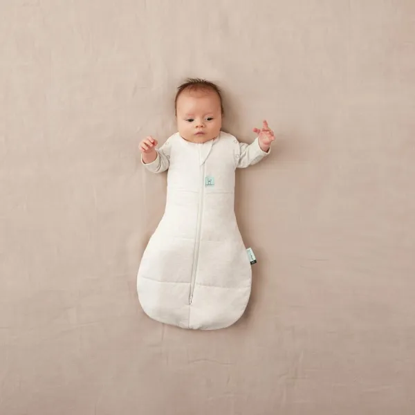ERGOPOUCH Zavinovačka a vak na spaní 2v1 Cocoon Oatmeal Marle 0-3 m, 3-6 kg, 2,5 tog