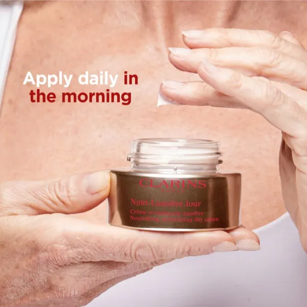 Clarins Nutri-Lumière Day revitalizačný denný krém pre žiarivý vzhľad pleti 50 ml