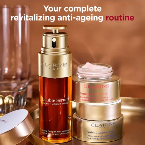 Clarins Nutri-Lumière Day revitalizačný denný krém pre žiarivý vzhľad pleti 50 ml