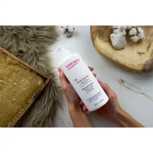 Topicrem AD Emollient Balm ošetrujúci telový balzam pre veľmi suchú citlivú a atopickú pokožku 500 ml