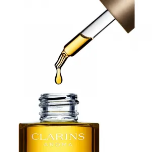 Clarins Lotus Treatment Oil regeneračný olej s vyhladzujúcim účinkom na deň aj noc 30 ml
