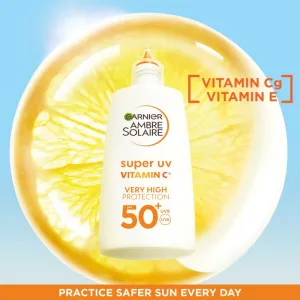 Garnier Ambre Solaire Super UV Vitamin C ľahký ochranný fluid proti tmavým škvrnám SPF 50+ 40 ml
