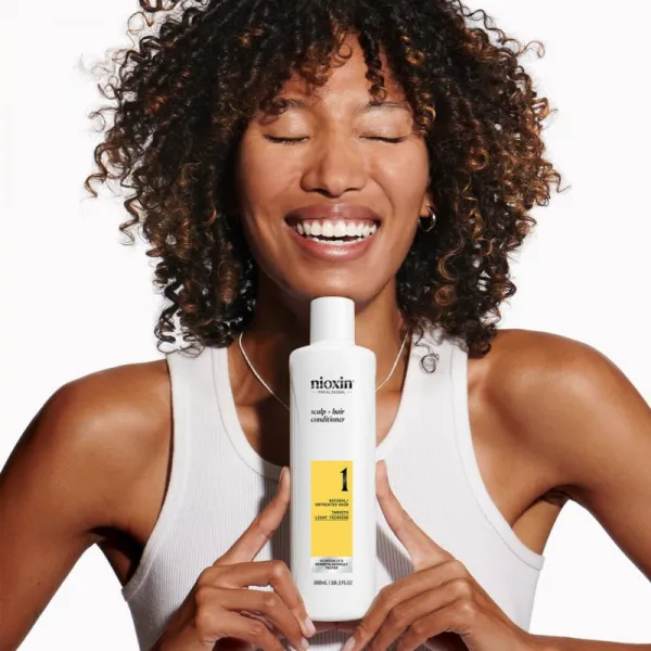 Nioxin System 1 kondicionér proti rednutiu vlasov 1000 ml