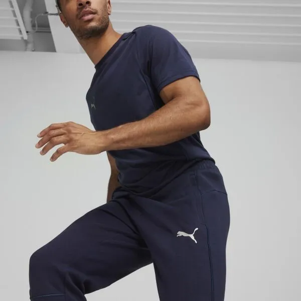 Puma TEAMFINAL CASUALS PANTS Pánske športové tepláky, tmavo modrá, veľkosť