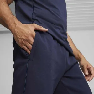 Puma TEAMFINAL CASUALS PANTS Pánske športové tepláky, tmavo modrá, veľkosť