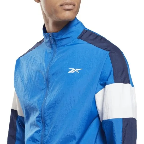 Reebok TRAIN WOVEN JACKET Pánska bunda, modrá, veľkosť