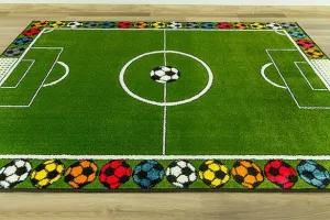 Detský koberec Rainbow 11377/130 futbalové ihrisko, zelený