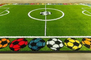 Detský koberec Rainbow 11377/130 futbalové ihrisko, zelený