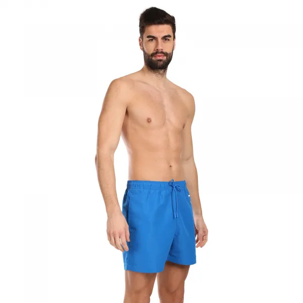 Pánske plavky Calvin Klein modré (KM0KM01004-DYO) M