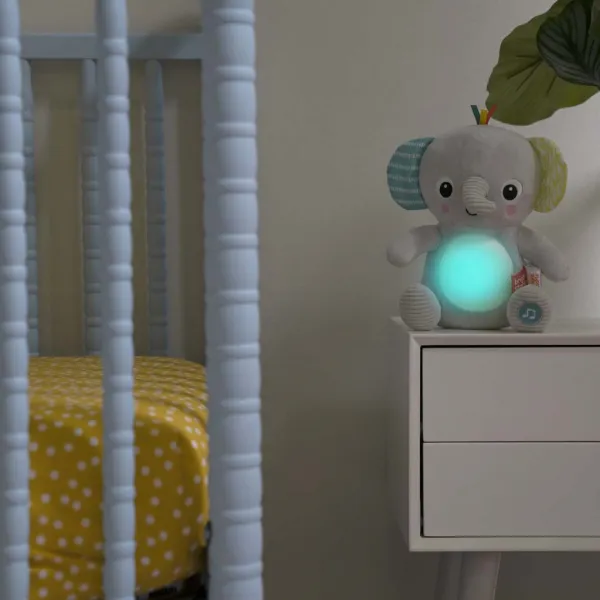 BRIGHT STARTS Hračka plyšová hudobná svietiaca Hug-a-bye Baby™ sloník 0m+