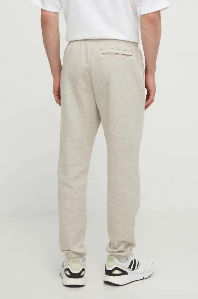 Under Armour teplákové nohavice pánske s bavlnou Essential Fleece