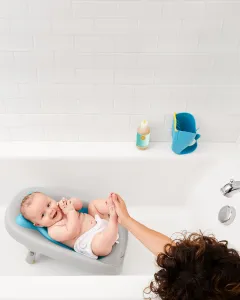 SKIP HOP Lehátko na kúpanie skladacie Moby modré 0-6m