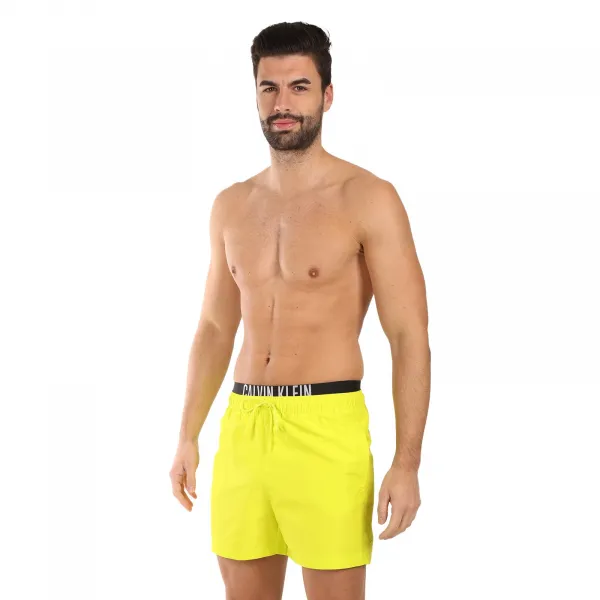 Pánske plavky Calvin Klein žlté (KM0KM01093-LRF) M