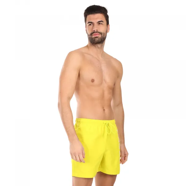 Pánske plavky Calvin Klein žlté (KM0KM01092-LRF) M