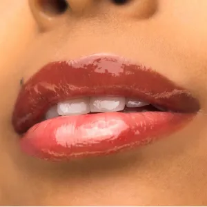 theBalm Plump Your Pucker Lip Gloss lesk na pery pre väčší objem odtieň Wild West 2.7 ml