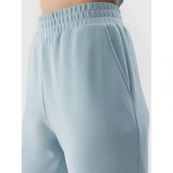 Dámske tepláky 4F TROUSERS-4FWSS24TTROF642-34S-LIGHT BLUE