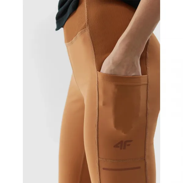 Dámske turistické legíny 4F TROUSERS FNK-WSS24TFTRF580-82S-LIGHT BROWN