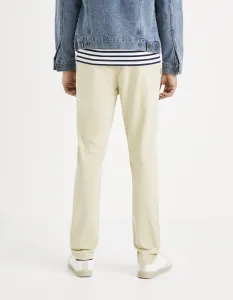 Krémové chino nohavice Celio Roprime