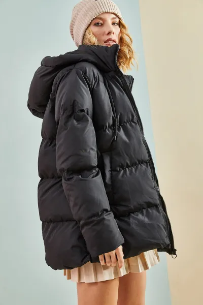Bianco Lucci Women's Long puffer jacket with a Lace-up hood.