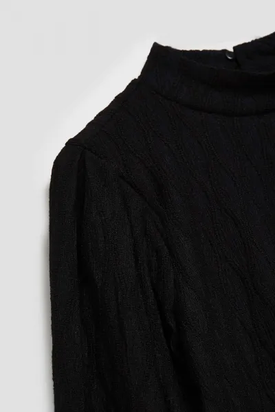 Marisse Black Turtleneck Blouse With Puffed Sleeves