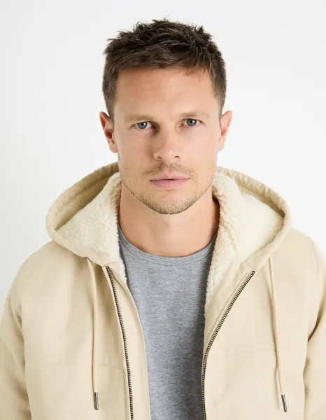 Krémová pánska bunda s umelým kožúškom Celio Fuhoodie