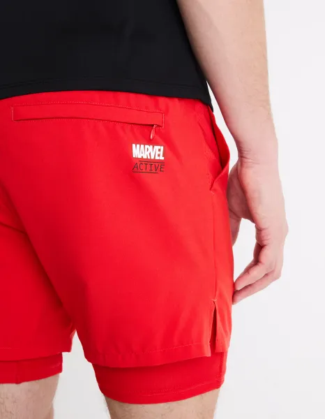 Červené športové kraťasy Celio Marvel - Iron Man